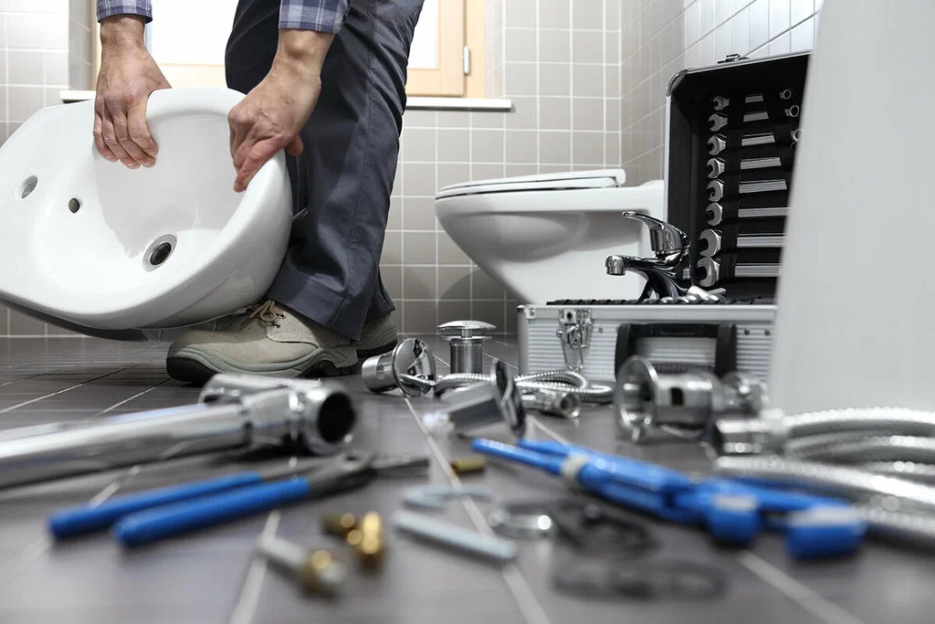 Plumbing tools prepared for a bathroom repair in Seaside